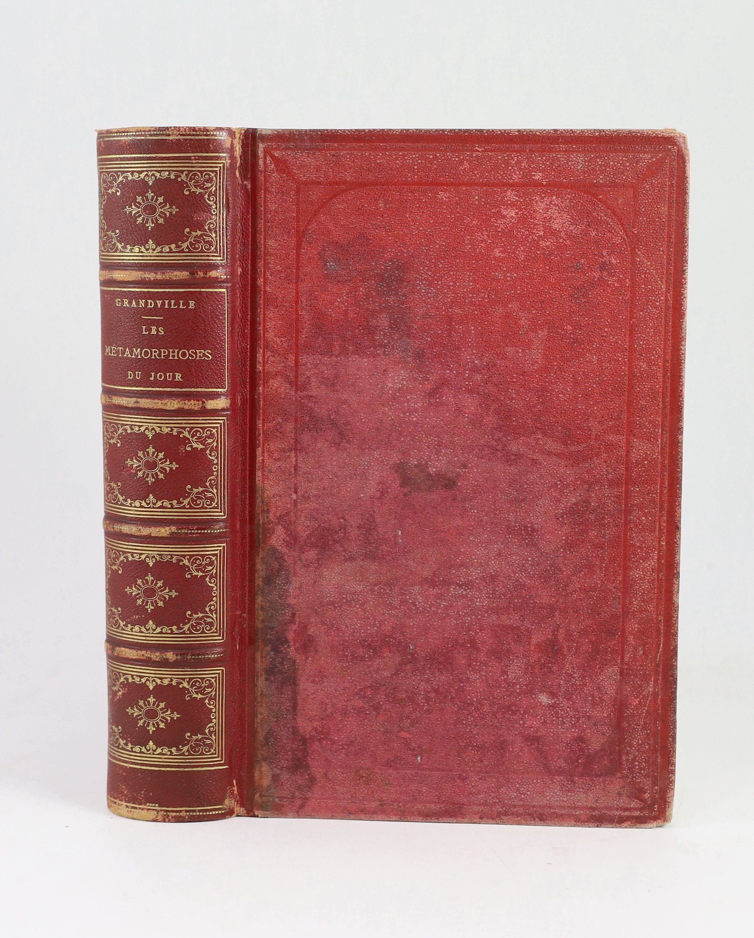 Grandville, J.I.I.G - La Metamorphoses du Jour par Grandville, 4to, quarter morocco gilt, with coloured frontis and 70 plates, occasional spotting throughout, Garnier Freres, Paris, 1869